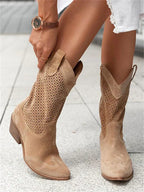 The Mary Stacy - Suede Western Ankle Boots with Perforation combine classic western style with contemporary flair.