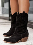 The Mary Stacy - Suede Western Ankle Boots with Perforation combine classic western style with contemporary flair.