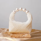 Lieke | Ivory Pearl-embellished Mini Clutch with Sculptural Handle