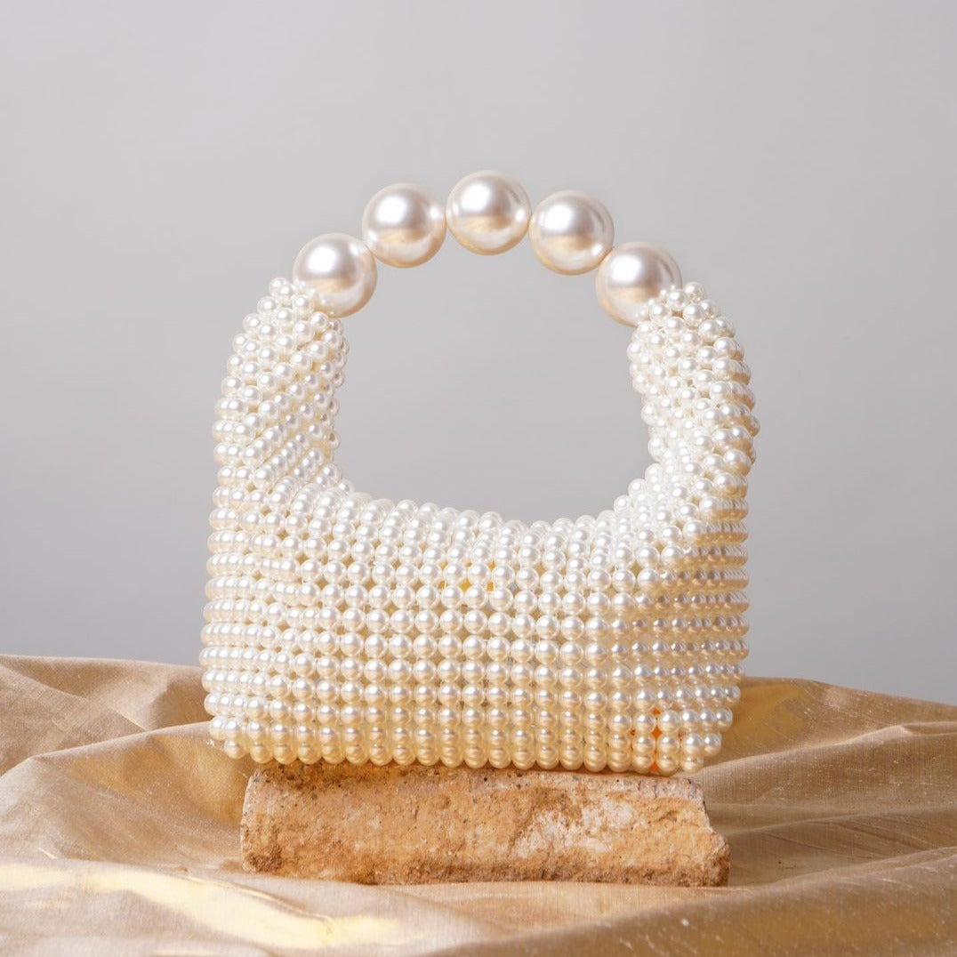 Lieke | Ivory Pearl-embellished Mini Clutch with Sculptural Handle